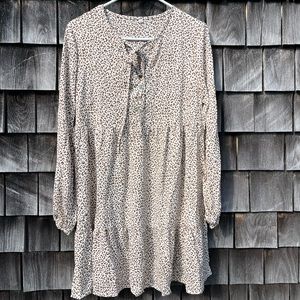 Animal print mini dress with tie and ruffle tiers